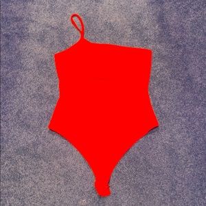 red one shoulder bodysuit